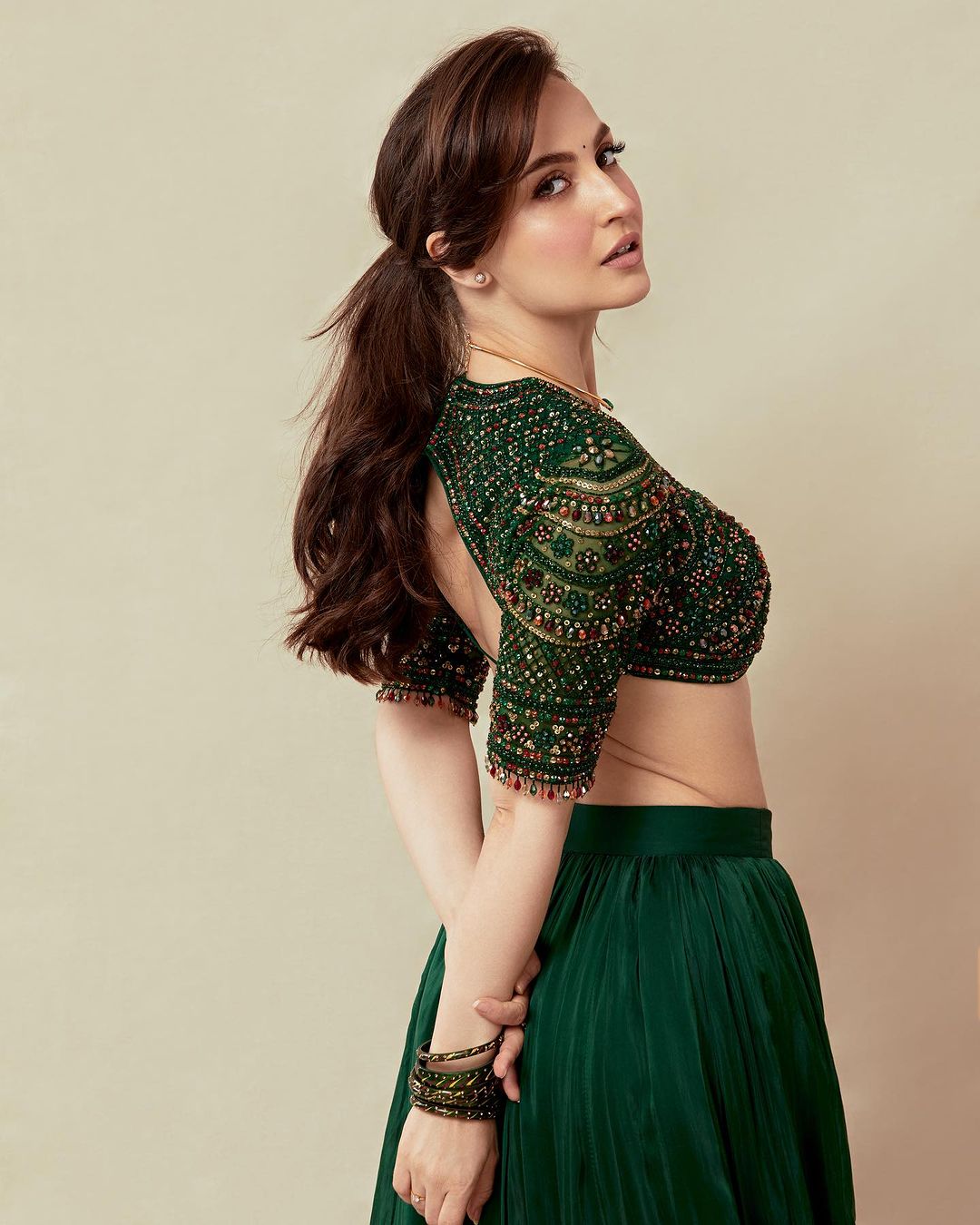 Mumbai Actress Elli AvrRam Images in Green Lehenga Choli